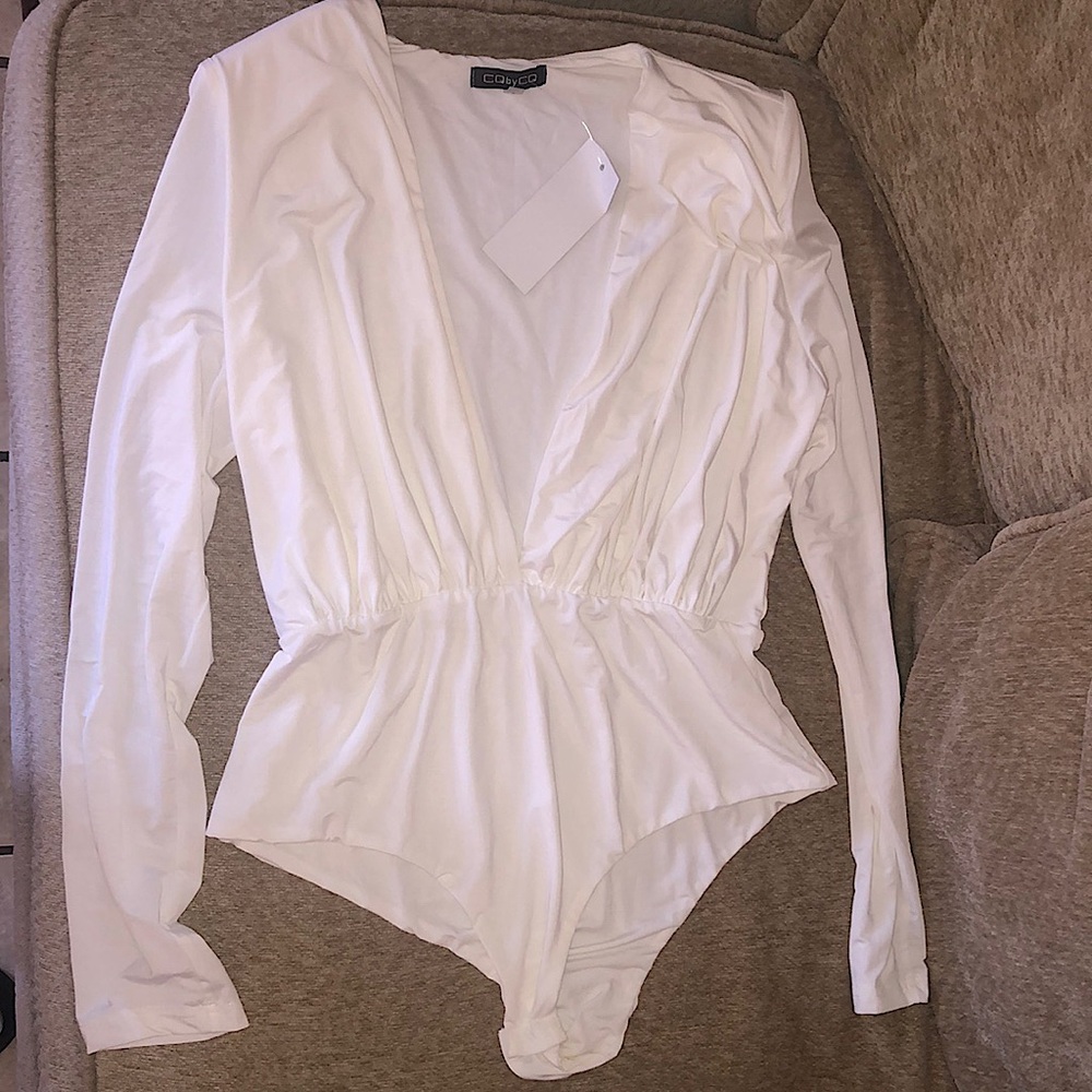 Brand new Elegant White BodySuit size L